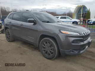 2014 Jeep Cherokee Limited with VIN 1C4PJMDB7EW138895, listed as a Copart auction lot 52585115 with 199,744 mi miles and Salvage Title. Bid and sale history available at DreamBid. Image 4.