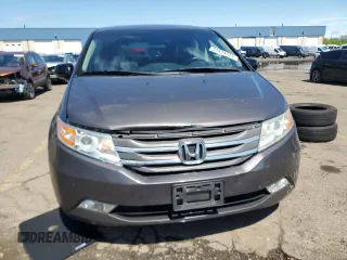 2012 Honda Odyssey Touring with VIN 5FNRL5H90CB093963, listed as a Copart auction lot 55434725 with 202,867 mi miles and Salvage Title. Bid and sale history available at DreamBid. Image 5.