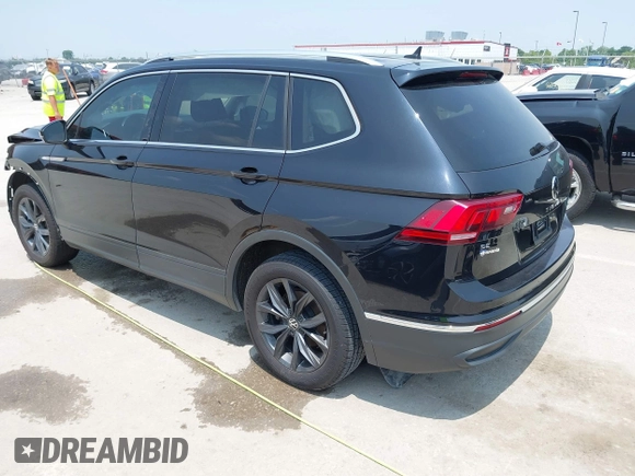 2023 Volkswagen Tiguan SE with VIN 3VVNB7AX5PM017938, listed as a IAAI auction lot 42453818 with 177,906 mi miles and . Bid and sale history available at DreamBid. Image 3.