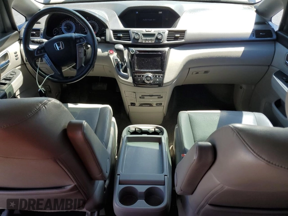 2014 Honda Odyssey Touring with VIN 5FNRL5H96EB068651, listed as a Copart auction lot 51649735 with 157,213 mi miles and Salvage title. Bid and sale history available at DreamBid. Image 8.