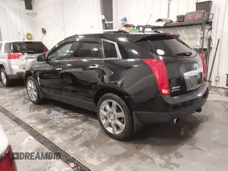 2011 Cadillac SRX Performance Collection with VIN 3GYFNEEY9BS675746, listed as a IAAI auction lot 41735676 with 113,079 mi miles and . Bid and sale history available at carsss.com. Image 3.