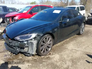 2014 Tesla Model S 60 with VIN 5YJSA1H1XEFP34226, listed as a IAAI auction lot 41806604 with 216,021 mi miles and . Bid and sale history available at DreamBid. Image 19.