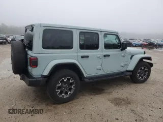 2024 Jeep Wrangler Sahara with VIN 1C4PJXEGXRW210206, listed as a Copart auction lot 58059115 with 14,492 mi miles and Salvage title. Bid and sale history available at DreamBid. Image 3.