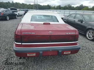1989 Chrysler LeBaron z VIN 1C3XJ45J8KG223051, wystawiony jako Copart lot #75115464 z przebiegiem 27 923 mil mil oraz Szkody całkowita. Historia ofert i sprzedaży dostępna na DreamBid. Obrazek 6.