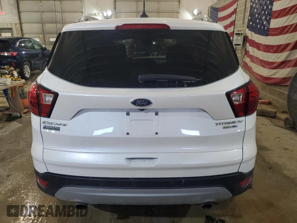 2019 Ford Escape Titanium with VIN 1FMCU9J97KUC37529, listed as a Copart auction lot 42243404 with 37,677 mi miles and Salvage Title. Bid and sale history available at carsss.com. Image 6.