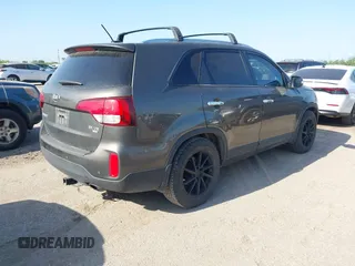 2015 Kia Sorento EX with VIN 5XYKU4A77FG555269, listed as a IAAI auction lot 42014317 with 168,218 mi miles and . Bid and sale history available at carsss.com. Image 4.