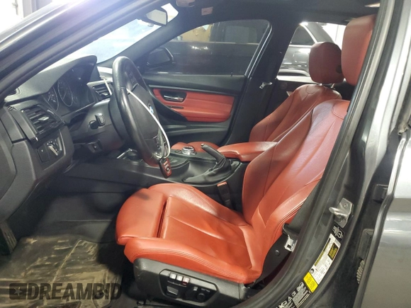 2014 BMW 3 Series 335i xDrive with VIN WBA3B9C59EP458568, listed as a Copart auction lot 61133085 with 177,009 mi miles and Salvage title. Bid and sale history available at DreamBid. Image 7.