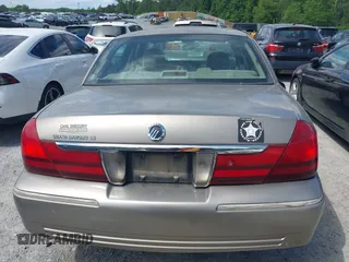 2003 Mercury Grand Marquis LS Premium z VIN 2MEFM75WX3X683205, wystawiony jako IAAI lot #42177139 z przebiegiem 200 521 mil mil oraz . Historia ofert i sprzedaży dostępna na DreamBid. Obrazek 16.