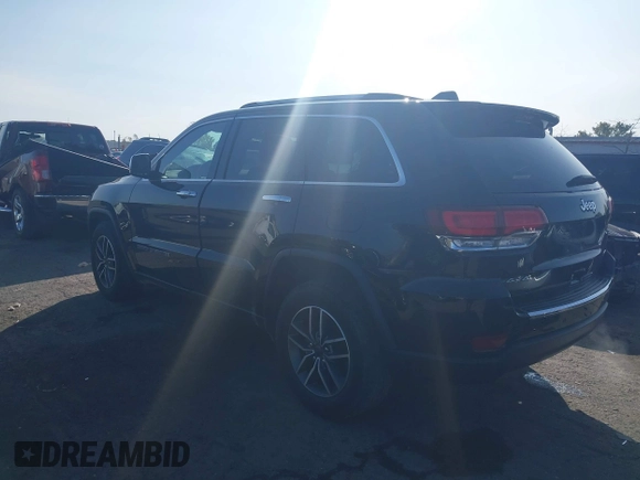 2021 Jeep Grand Cherokee 80th Anniversary with VIN 1C4RJFBG6MC711983, listed as a IAAI auction lot 40633511 with 22,480 mi miles and . Bid and sale history available at DreamBid. Image 3.
