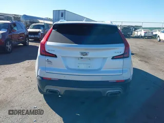2020 Cadillac XT4 AWD Premium Luxury z VIN 1GYFZDR46LF083118, wystawiony jako IAAI lot #40495567 z przebiegiem 83 224 mil mil oraz . Historia ofert i sprzedaży dostępna na DreamBid. Obrazek 16.