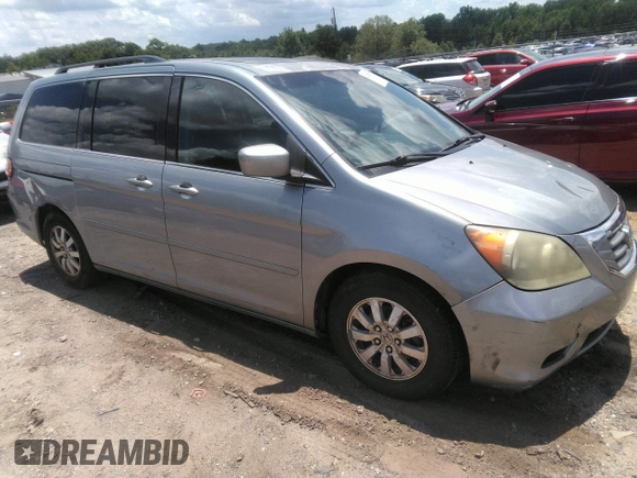 2010 Honda Odyssey EX-L z VIN 5FNRL3H74AB104446, wystawiony jako IAAI lot #42765331 z przebiegiem 319 510 mil mil oraz . Historia ofert i sprzedaży dostępna na DreamBid. Obrazek 1.
