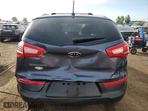2012 Kia Sportage LX with VIN KNDPB3A20C7193384, listed as a Copart auction lot 63897595 with 308,479 mi miles and Salvage title. Bid and sale history available at DreamBid. Image 6.