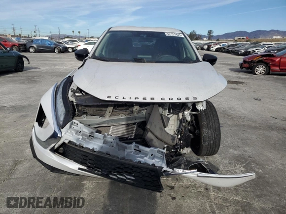 2022 Mitsubishi Eclipse Cross LE z VIN JA4ASVAA6NZ053737, wystawiony jako Copart lot #42157625 z przebiegiem 18 191 mil mil oraz Szkoda całkowita • Salvage title. Historia ofert i sprzedaży dostępna na DreamBid. Obrazek 5.