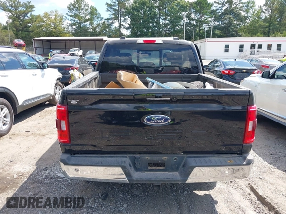 2021 Ford F-150 XL with VIN 1FTFW1E5XMKE21429, listed as a IAAI auction lot 40347406 with 125,000 mi miles. Bid and sale history available at carsss.com. Image 16.