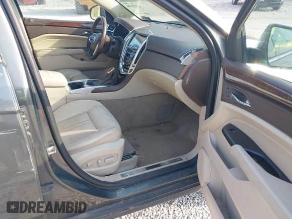 2013 Cadillac SRX Luxury Collection with VIN 3GYFNCE31DS587415, listed as a IAAI auction lot 42020500 with 279,638 mi miles and . Bid and sale history available at DreamBid. Image 5.