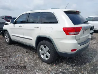 2011 Jeep Grand Cherokee Laredo with VIN 1J4RR4GG7BC701007, listed as a IAAI auction lot 42704995 with 145,956 mi miles and . Bid and sale history available at DreamBid. Image 3.