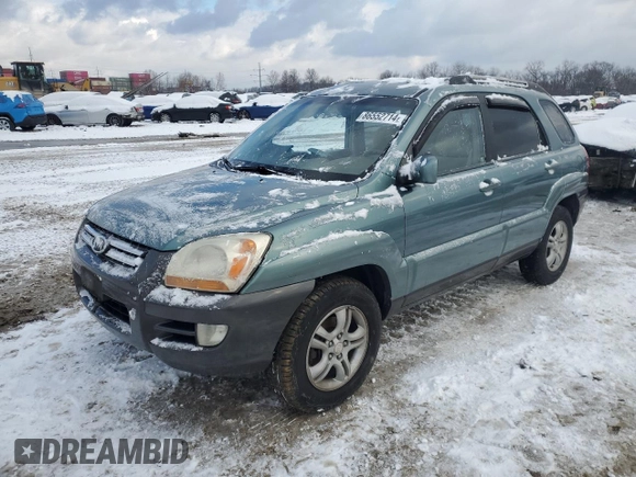 2005 Kia Sportage LX with VIN KNDJF723X57125430, listed as a Copart auction lot 86552714 with Not Provided miles and Salvage Title. Bid and sale history available at carsss.com. Image 1.