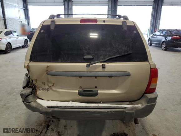 2001 Jeep Grand Cherokee Laredo with VIN 1J4GW48S91C563312, listed as a Copart auction lot 85728604 with 284,525 mi miles and Clean Title. Bid and sale history available at carsss.com. Image 6.