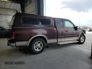 2001 Ford F-150 XL with VIN 1FTRX17W71NA45086, listed as a Copart auction lot 54182945 with 173,998 mi miles and Salvage title. Bid and sale history available at DreamBid. Image 3.
