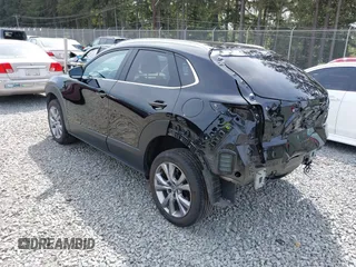 2023 Mazda CX-30 S Carbon Edition with VIN 3MVDMBCM3PM562447, listed as a IAAI auction lot 42174280 with 22,028 mi miles and . Bid and sale history available at DreamBid. Image 3.