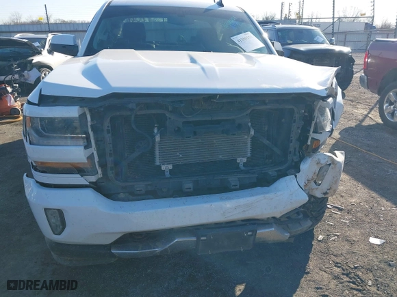 2016 Chevrolet Silverado 1500 LT with VIN 3GCUKREC6GG306239, listed as a IAAI auction lot 41380251 with 128,042 mi miles. Bid and sale history available at carsss.com. Image 19.