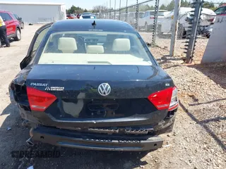 2012 Volkswagen Passat SE z VIN 1VWBH7A37CC065205, wystawiony jako IAAI lot #41977813 z przebiegiem Nie podano mil oraz . Historia ofert i sprzedaży dostępna na DreamBid. Obrazek 17.