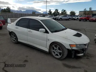 2005 Mitsubishi Lancer Evolution VIII with VIN JA3AH86D45U028033, listed as a Copart auction lot 74323774 with 204,046 mi miles and Salvage Title. Bid and sale history available at carsss.com. Image 4.