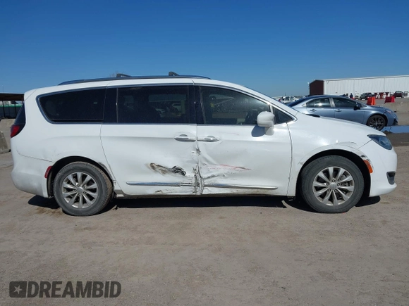 2018 Chrysler Pacifica Touring L with VIN 2C4RC1BG1JR119682, listed as a IAAI auction lot 41762362 with 167,380 mi miles and . Bid and sale history available at DreamBid. Image 13.