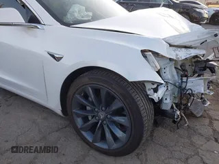 2020 Tesla Model 3 Performance with VIN 5YJ3E1EC1LF602516, listed as a IAAI auction lot 41841216 with 28,967 mi miles and . Bid and sale history available at DreamBid. Image 19.