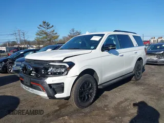 2024 Ford Expedition Timberline with VIN 1FMJU1RG1REB10629, listed as a IAAI auction lot 41974714 with 1,232 mi miles and . Bid and sale history available at DreamBid. Image 2.