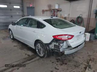 2016 Ford Fusion SE with VIN 3FA6P0T94GR268243, listed as a IAAI auction lot 41690685 with 63,327 mi miles. Bid and sale history available at carsss.com. Image 3.