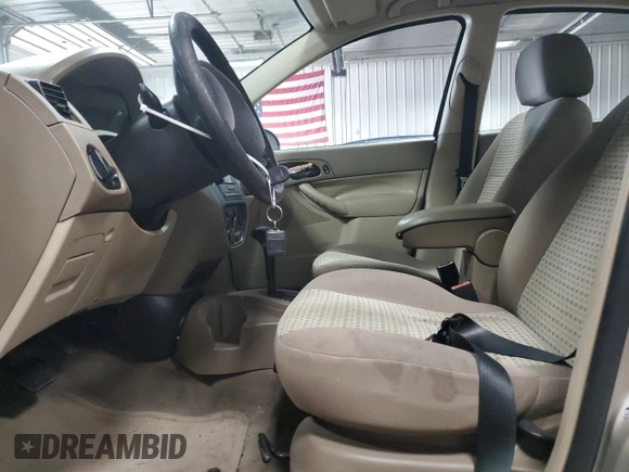 2007 Ford Focus S z VIN 1FAFP34N17W250616, wystawiony jako Copart lot #57055515 z przebiegiem 130 990 mil mil oraz Nie do naprawy • Non repairable. Historia ofert i sprzedaży dostępna na DreamBid. Obrazek 7.