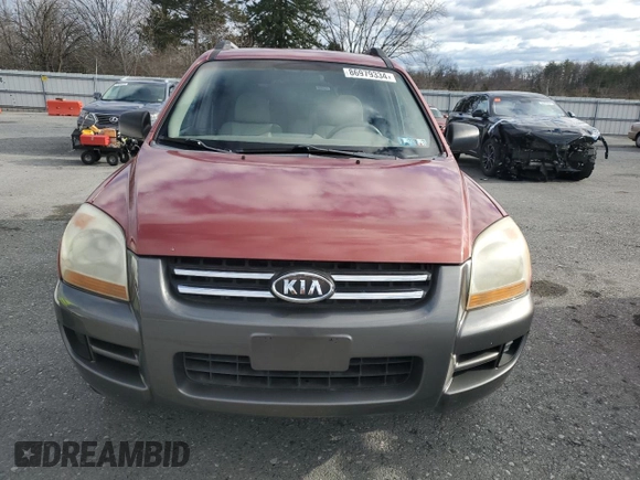 2005 Kia Sportage LX with VIN KNDJE723257052220, listed as a Copart auction lot 86979334 with 113,717 mi miles and Clean title. Bid and sale history available at DreamBid. Image 5.