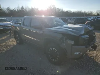 2022 Nissan Frontier Pro-4X z VIN 1N6ED1EK4NN611473, wystawiony jako Copart lot #89142785 z przebiegiem 24 871 mil mil oraz Szkody całkowita. Historia ofert i sprzedaży dostępna na DreamBid. Obrazek 4.