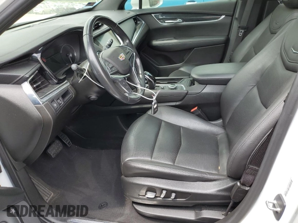 2020 Cadillac XT5 Premium Luxury FWD with VIN 1GYKNCRS5LZ229686, listed as a Copart auction lot 57391915 with 54,491 mi miles and Salvage title. Bid and sale history available at DreamBid. Image 7.
