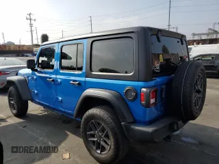 2023 Jeep Wrangler Sport Altitude with VIN 1C4HJXDN6PW541088, listed as a Copart auction lot 82178424 with 30,675 mi miles and Salvage Title. Bid and sale history available at DreamBid. Image 2.
