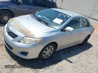 2009 Toyota Corolla with VIN JTDBL40E99J010861, listed as a IAAI auction lot 42143607 with 333,838 mi miles and . Bid and sale history available at DreamBid. Image 2.