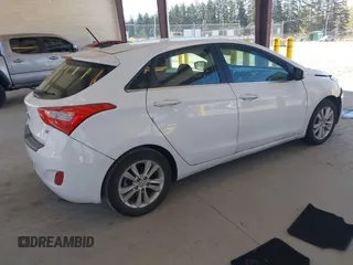 2014 Hyundai Elantra GT with VIN KMHD35LH0EU234707, listed as a IAAI auction lot 42046837 with 47,447 mi miles. Bid and sale history available at carsss.com. Image 4.