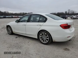 2018 BMW 3 Series 320i xDrive with VIN WBA8A3C55JA494888, listed as a Copart auction lot 87459204 with 86,876 mi miles and Salvage title. Bid and sale history available at DreamBid. Image 2.
