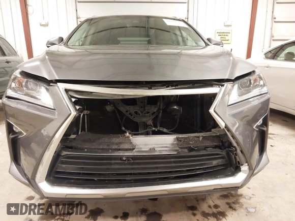 2017 Lexus RX 350 with VIN 2T2BZMCA7HC121812, listed as a IAAI auction lot 41868533 with 101,128 mi miles and . Bid and sale history available at DreamBid. Image 6.
