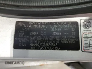 2009 Kia Spectra EX with VIN KNAFE221X95650545, listed as a Copart auction lot 74496974 with 203,752 mi miles and Non Repairable. Bid and sale history available at carsss.com. Image 12.