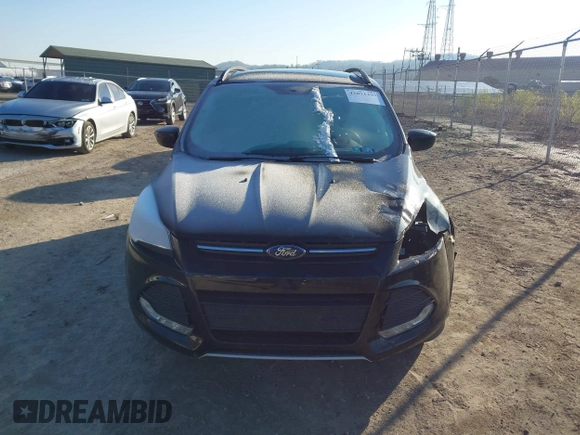2016 Ford Escape SE with VIN 1FMCU9GX6GUB13846, listed as a IAAI auction lot 42051393 with 108,681 mi miles and . Bid and sale history available at DreamBid. Image 13.