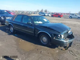 1999 Mercury Grand Marquis LS with VIN 2MEFM75W2XX641598, listed as a IAAI auction lot 41112721 with 152,801 mi miles. Bid and sale history available at carsss.com. Image 1.