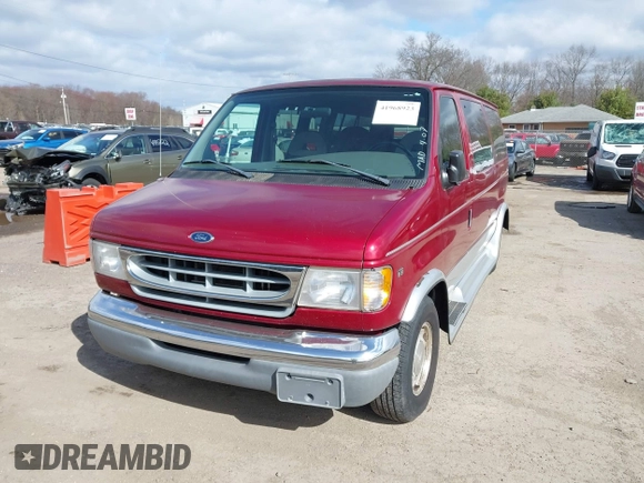 1999 Ford Econoline Passenger XL with VIN 1FMRE11L1XHA05657, listed as a IAAI auction lot 41968923 with 150,868 mi miles and . Bid and sale history available at carsss.com. Image 2.