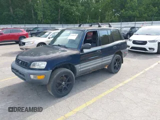 1999 Toyota RAV4 with VIN JT3HP10V2X7120498, listed as a IAAI auction lot 42409235 with 215,769 mi miles and . Bid and sale history available at DreamBid. Image 2.