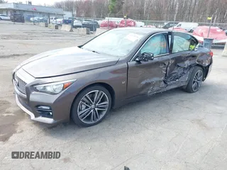 2014 Infiniti Q50 Premium z VIN JN1BV7AR0EM687810, wystawiony jako IAAI lot #42073610 z przebiegiem 167 912 mil mil oraz . Historia ofert i sprzedaży dostępna na DreamBid. Obrazek 2.
