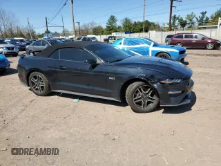 2019 Ford Mustang GT Premium with VIN 1FATP8FF7K5179636, listed as a Copart auction lot 51994055 with 123,771 mi miles and Salvage title. Bid and sale history available at DreamBid. Image 4.