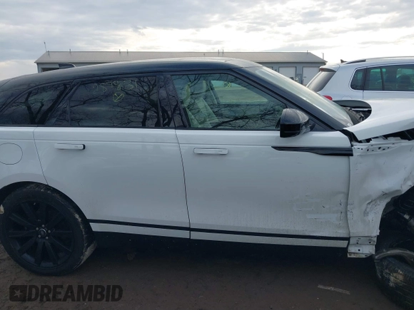 2020 Land Rover Range Rover Velar S z VIN SALYB2EX9LA287831, wystawiony jako IAAI lot #41667186 z przebiegiem 46 965 mil mil oraz . Historia ofert i sprzedaży dostępna na DreamBid. Obrazek 13.