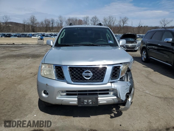 2011 Nissan Pathfinder LE z VIN 5N1AR1NB5BC623749, wystawiony jako Copart lot #51309485 z przebiegiem 199 545 mil mil oraz Szkoda całkowita • Salvage title. Historia ofert i sprzedaży dostępna na DreamBid. Obrazek 5.