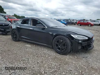 2014 Tesla Model S 60 with VIN 5YJSA1H11EFP65266, listed as a Copart auction lot 60934805 with 93,546 mi miles and Salvage title. Bid and sale history available at DreamBid. Image 4.
